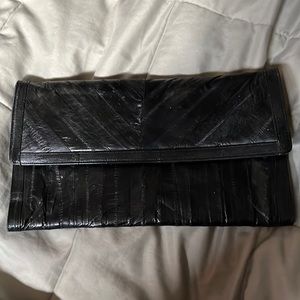 Black eel skin clutch bag